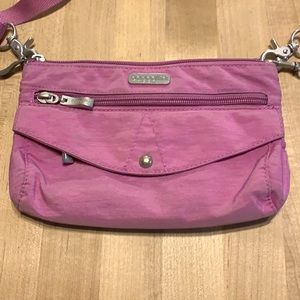 Baggallini crossbody, small with many pockets. Can be a wristlet also.